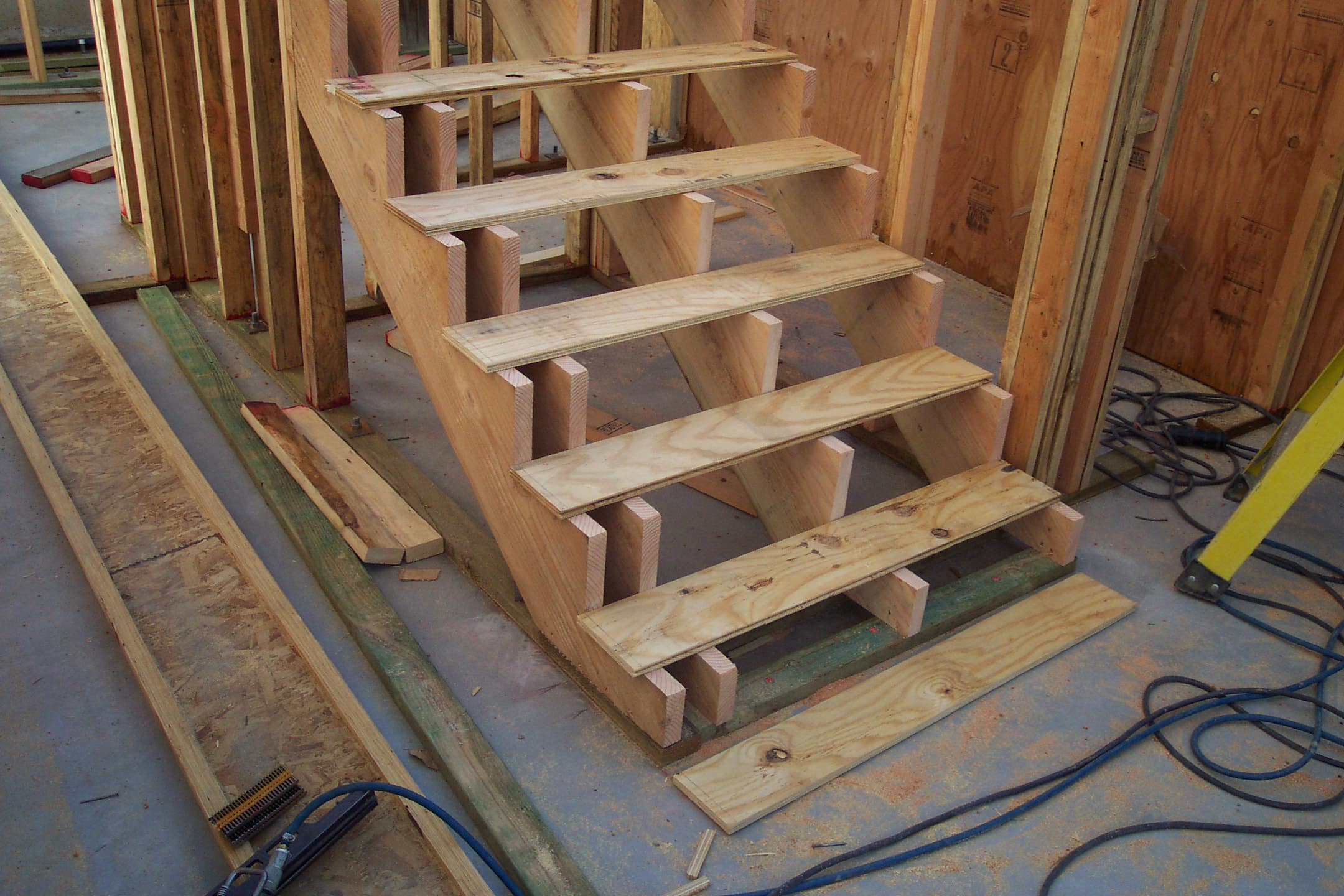 Angled View of Lower Stairway About to Nail Risers